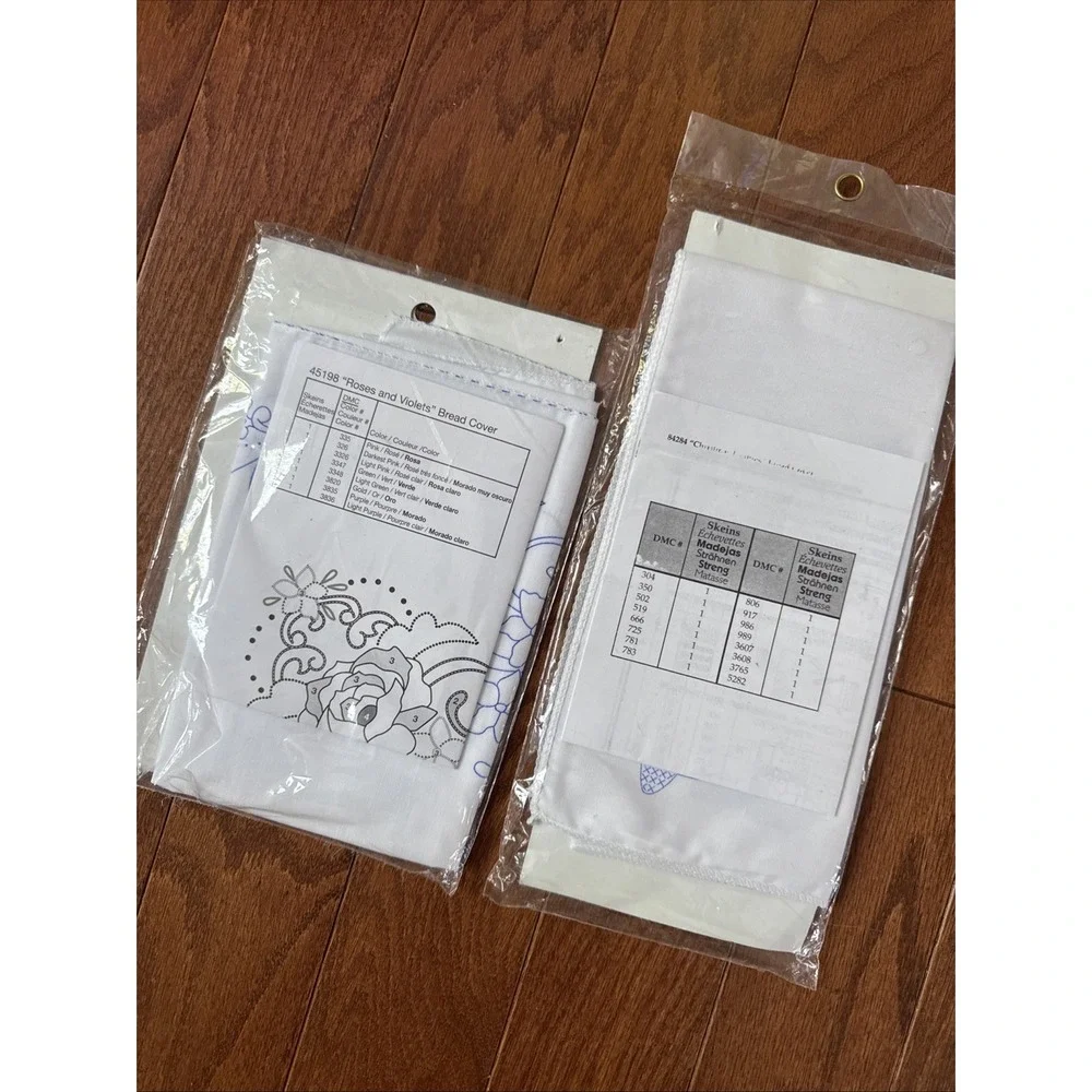 (2) Bucilla Christmas/ Roses & VioletsCross Stitch - #84284 & 45198 Bread Covers